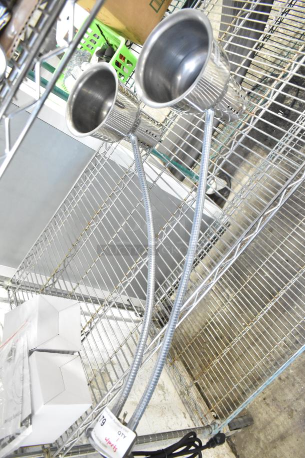 Avantco Commercial 2 Head Lamp with adjustable goosenecks. 115 Volts, 1 Phase. Chrome finish, shown on wire rack display.