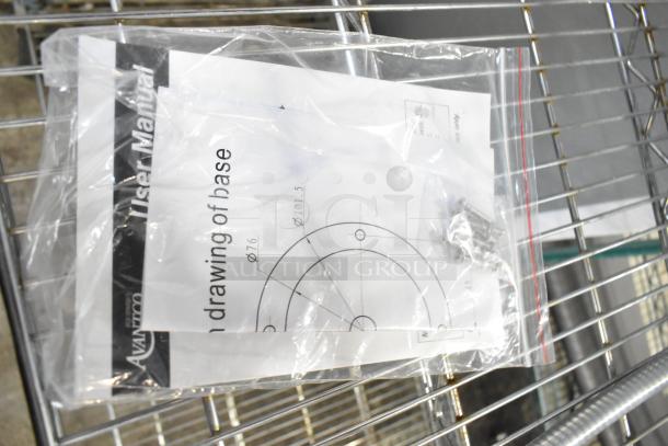 Avantco Commercial 2 Head Lamp, 115 Volts, 1 Phase, in packaging with user manual and base drawing visible.