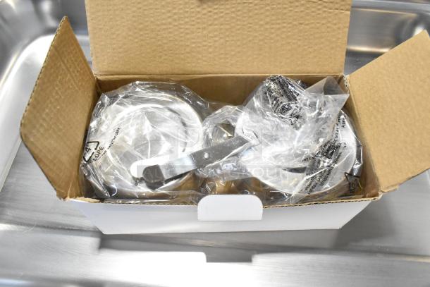 Brand new countertop chafer in open box. Includes wrapped components. Minor scratches and dents.