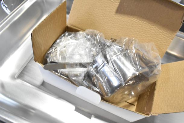 Brand new countertop chafer in box, showing shiny metal components. Condition noted as scratch and dent.