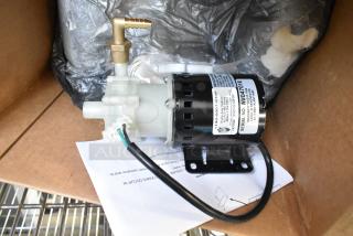 Brand new scratch and dent pump assembly, 115 volts, 1 phase, visible serial number, instructions included.