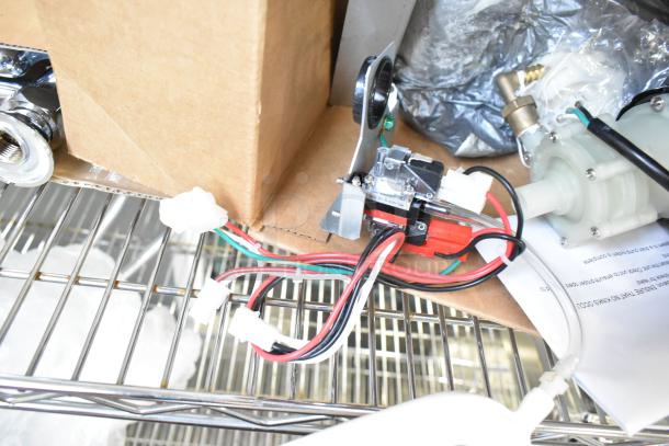 Brand new pump assembly, 115 Volts, 1 Phase, with wiring and connectors shown; scratch and dent condition.