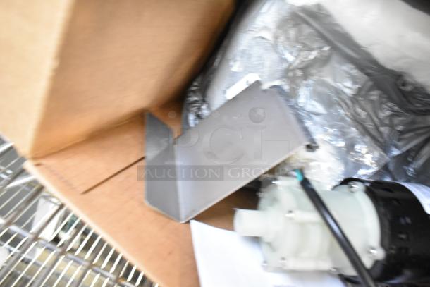 BRAND NEW Scratch and Dent pump assembly, 115 volts, 1 phase, shown in packaging.