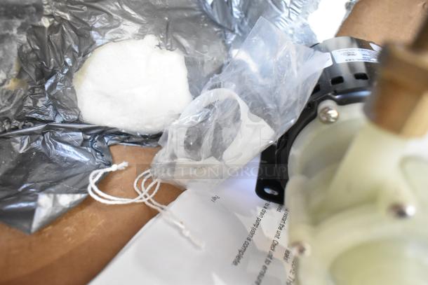 Brand new pump assembly, 115V, 1 phase, with minor cosmetic dents. Includes packaging materials and instructions.