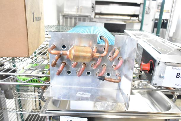 Brand new evaporator coil, model 17812873HC, with slight scratches and dents, featuring visible copper tubing.