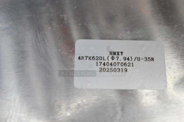 Brand new scratch and dent 17404070621 evaporator coil with label showing model 4R7K620L specifications.