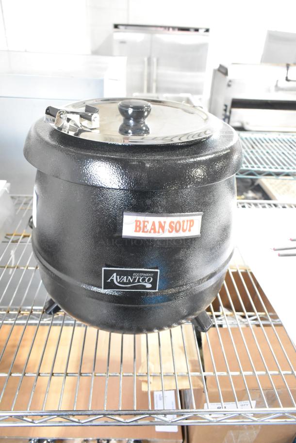 Brand new Avantco 177S30 11 Qt. black soup kettle warmer, 120 volts, 1 phase, with "Bean Soup" label.