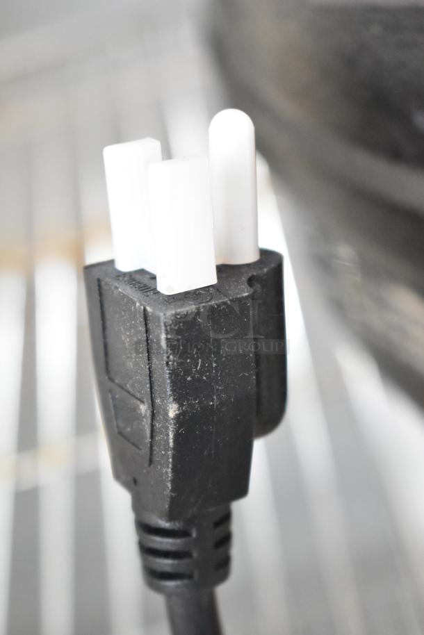 Alt Text: Avantco 177S30 11 Qt. black soup kettle warmer, brand new with scratch and dent, 120V plug detail shown.