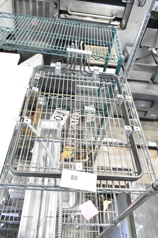 Brand new burner with minor scratches and dents; metal construction, part of a shelving unit. Price tag showing "88."