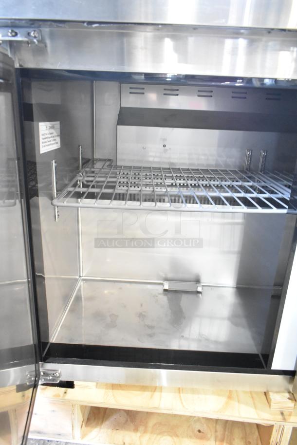 Brand new Avantco 178AU48R 2-door undercounter cooler, 115 volts, 1 phase. Scratch and dent condition visible.