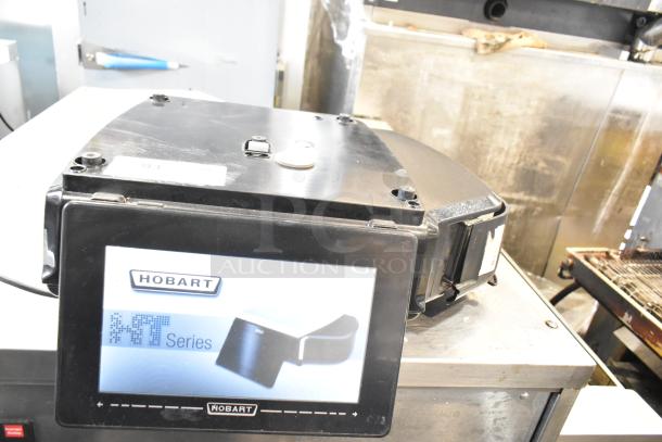 2025 Hobart HTi-7LH4W commercial countertop scale, black finish, tested and working, for 120/208-240V, 1 phase.