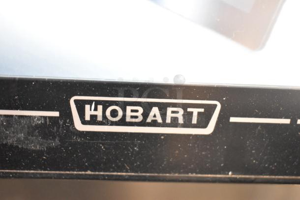 Hobart HTi-7LH4W commercial countertop scale, 120/208-240V, 1 phase. Tested and working, featuring a prominent Hobart logo.