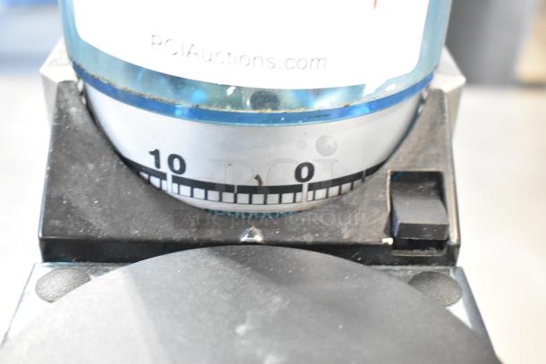 Rancilio Rocky Doser espresso grinder, missing lid; shows grind settings. 110V, 1 phase. Used condition, visible markings.