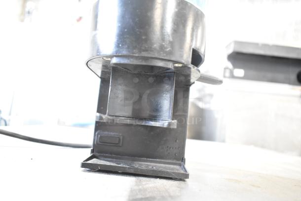 Rancilio Rocky Doser espresso grinder without lid, 110V, 1 phase. Black finish, countertop use, in fair condition.