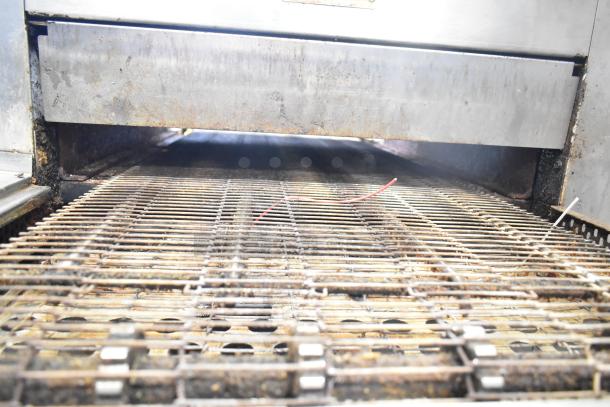 Two 2021 Middleby Marshall CTX DZ33I stainless steel conveyor pizza ovens on casters, used, 208V, 3/1 phase.