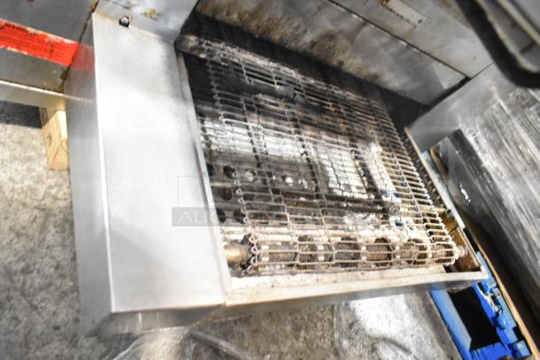 Middleby Marshall CTX DZ33I stainless steel conveyor pizza oven on casters, showing internal conveyor and structure.