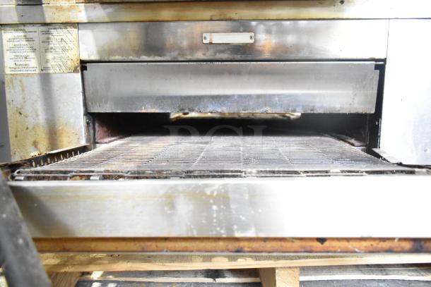 Middleby Marshall CTX DZ33I stainless steel conveyor pizza oven, 208 volts, commercial casters, visible wear.