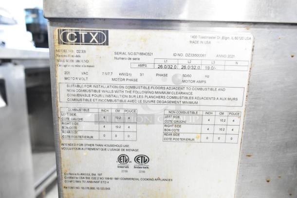 2 Middleby Marshall CTX DZ33I conveyor pizza ovens, stainless steel, electric, 208V, 3/1 Phase. Model and specs label visible.