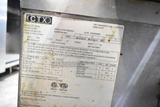 Two 2021 Middleby Marshall CTX DZ33I stainless steel commercial electric conveyor pizza ovens, 208V, on casters.