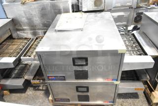 2 2021 Middleby Marshall CTX DZ33T Stainless Steel Commercial Electric Powered Conveyor Pizza Ovens on Commercial Casters. 208 Volts, 3/1 Phase. 2 Times Your Bid!