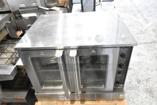 Brand new Mainstreet 541CG1N convection oven, single deck, 54,000 BTU, natural gas, view-through doors, thermostatic controls.