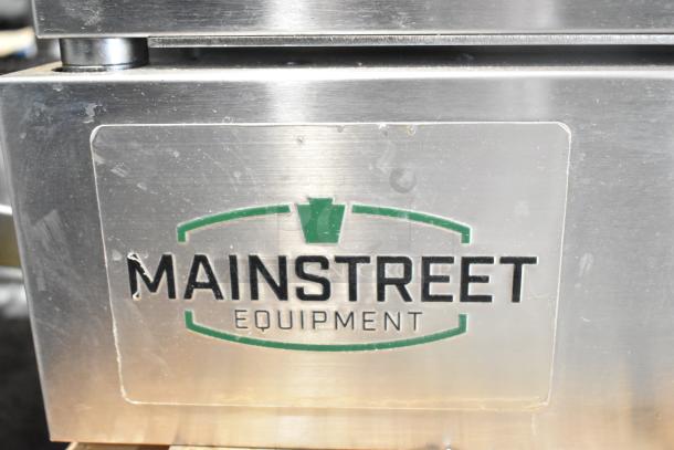 Mainstreet 541CG1N convection oven label on stainless steel surface, showing brand logo and equipment details.