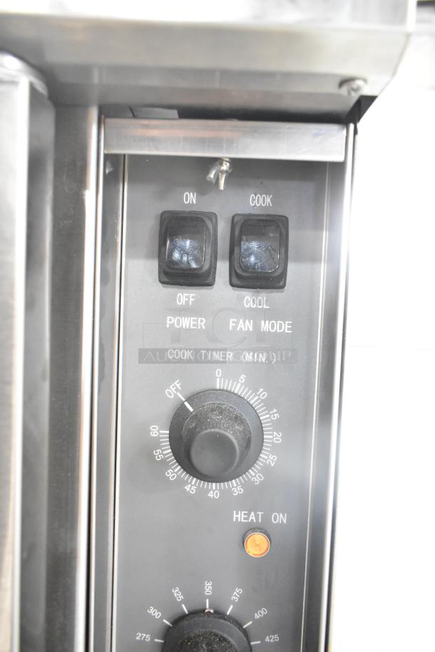 Mainstreet 541CG1N convection oven control panel, featuring cook timer, power, and fan mode switches, thermostat settings.