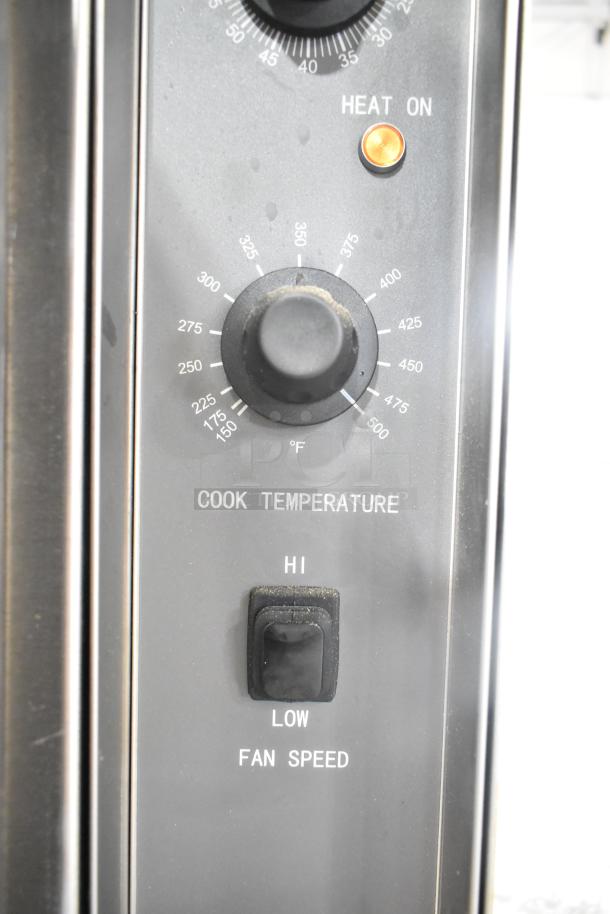Mainstreet 541CG1N convection oven control panel, features cook temperature dial, fan speed switch, and heat indicator light.