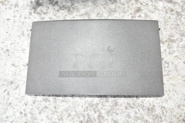 Flat gray panel from a 2025 Manitowoc UDP0065A-161 Ice Machine. Surface shows minor imperfections.