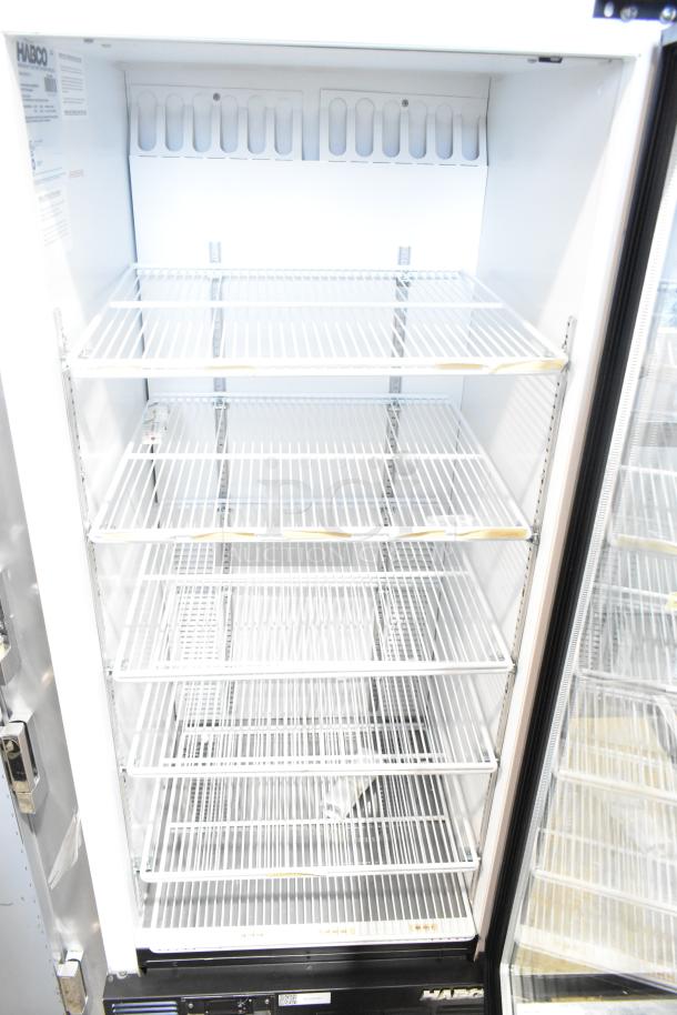 Habco SE12 commercial cooler, single door, 115V, 1 phase, white interior, adjustable shelves, brand label visible inside.