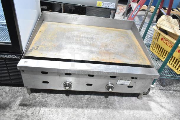 US Range Commercial Gas Griddle; stainless steel; worn condition with visible rust; three control knobs; Model: Countertop.