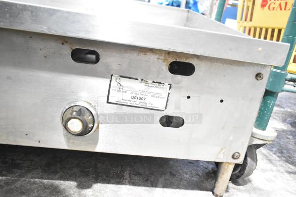 US Range Commercial Gas Griddle. Stainless steel, worn condition. Service label: Clark Associates, PA, model D01507.