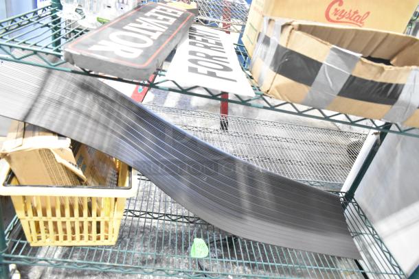 Two-tier lot with assortment of items, including signs, glasses, packaged parts, and a Central 0331-L1/2 Self-Close Straight Stop.