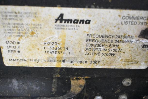 Amana AXP20 commercial rapid cook oven label, showing model, manufacture date (October 2007), and power specifications.