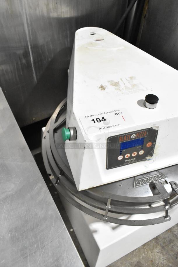 Proluxe Commercial Countertop Dough Press with control panel, signs of wear, auction ID label visible, "Caution Hot" warning.