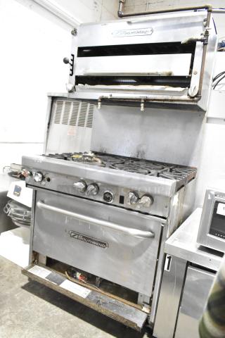 Southbend commercial 6-burner natural gas range with oven, cheese melter, and backsplash. Used condition. Southbend logo visible.