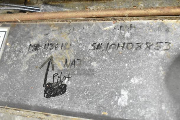 Southbend commercial gas range with 6 burners, oven, cheese melter, and backsplash. Marked: "M# 45161" and "S# 16H03853".