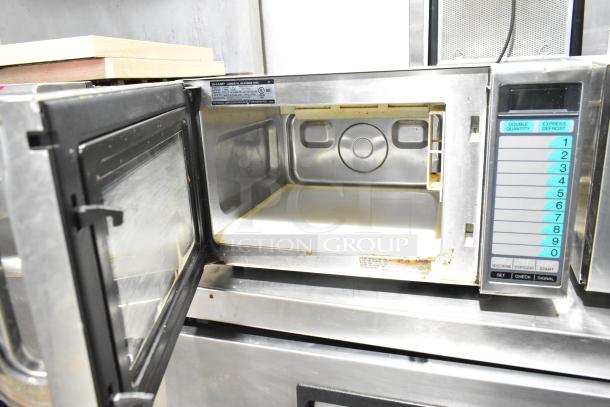 2022 Sharp R-21LVF commercial countertop microwave oven, 120 volts, 1 phase, stainless steel interior, good condition.