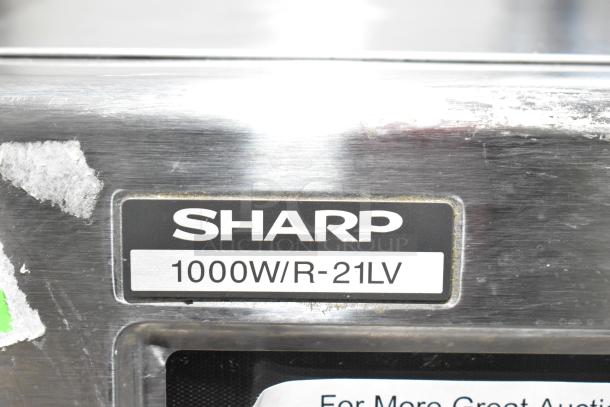 Sharp R-21LVF commercial microwave oven label, displaying "1000W/R-21LV" in stainless steel.