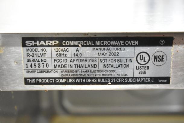 2022 Sharp R-21LVF commercial microwave label, details 120VAC, 60Hz, 14A, made in Thailand, manufactured May 2022.