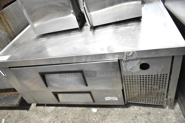 True Commercial 2 Drawer Chef Base with commercial casters, stainless steel, 115 volts, 1 phase, showing wear.