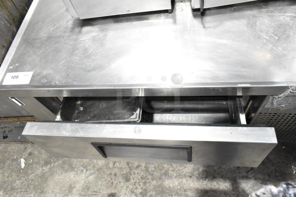True Commercial 2 Drawer Chef Base, stainless steel, on commercial casters. 115 volts, 1 phase. Visible wear, auction tag 109.