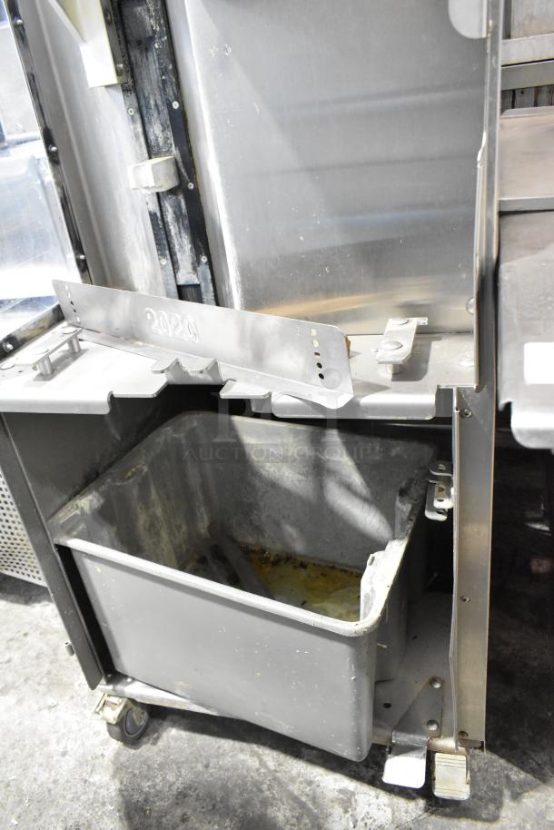 LATE MODEL! JBT 2ND-GEN-MFJ-HE citrus juicer with commercial casters, stainless steel, used condition, 115V, 1 phase.