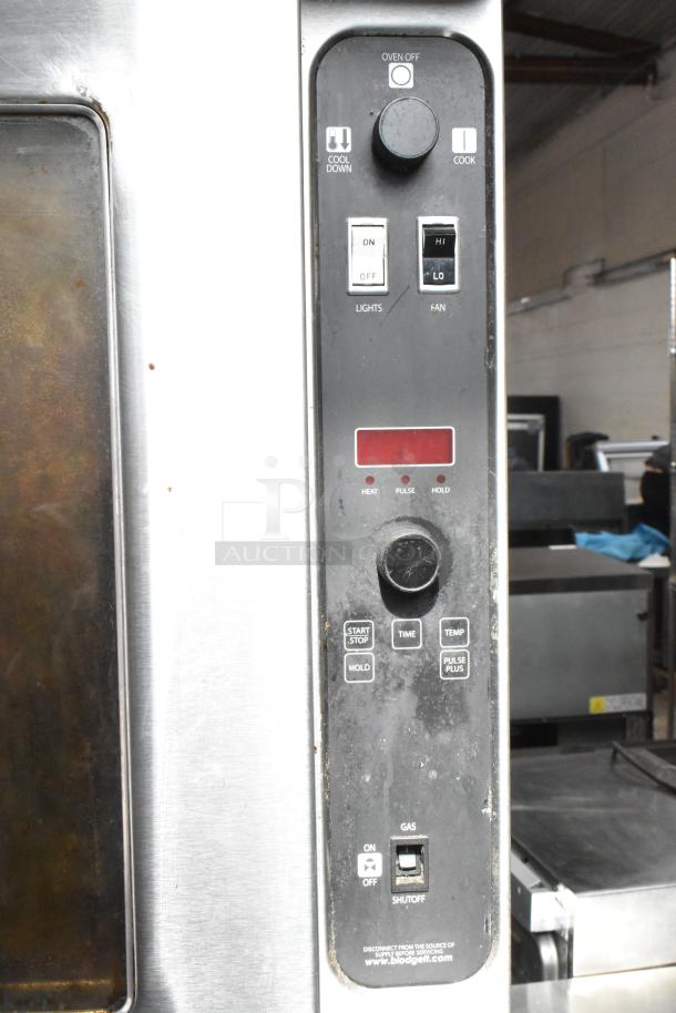 Blodgett DFG-100-3 convection oven control panel with knobs, switches, and display; shows thermostatic controls.