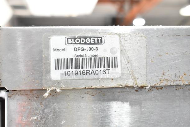 Blodgett DFG-100-3 convection oven label showing model and serial number on metal surface, with noticeable wear.