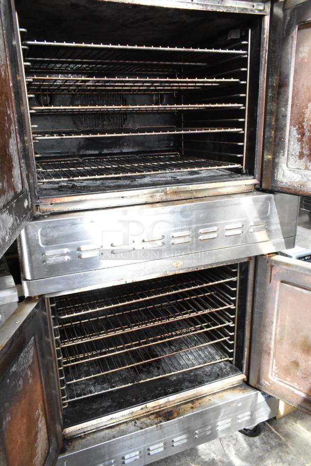 Two 2016 Blodgett DFG-100-3 commercial convection ovens with view-through doors, thermostatic controls, on casters.