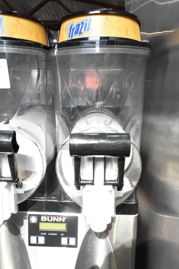 Bunn Commercial 2 Hopper Slushie Machine, 115 Volts, 1 Phase. Features dual hoppers, clear dispensing nozzles, and front control panel.