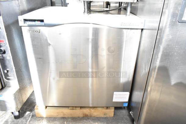 Scotsman Prodigy Commercial Ice Head, stainless steel, visible brand logo, minor surface dents, on wooden pallet.