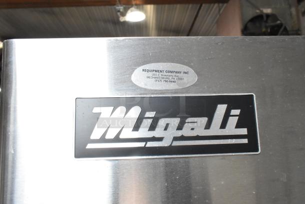 2017 Migali C-1R commercial single door reach-in cooler, stainless steel, on casters. 115 volts, 1 phase, visible labels.