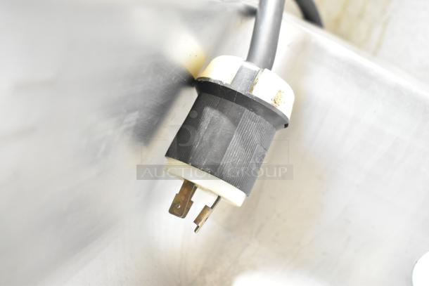 Taylor 2 Flavor Frozen Beverage Machine plug detail, showing 208/240V power specification, indicative of commercial use.